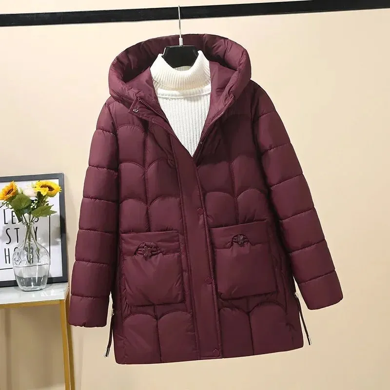 2024 Winter Damen Daunen Baumwolle warme Mäntel neue stilvolle Midi-Länge Kapuze leichte gepolsterte Parkas Taschen lose Jacke weiblich