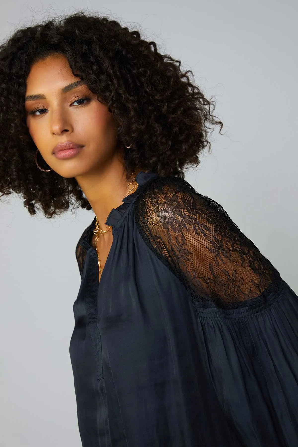 Sure! Heres an optimized title with descriptive modifiers:

Elegant Black Enchanted Satin Blouse for Women