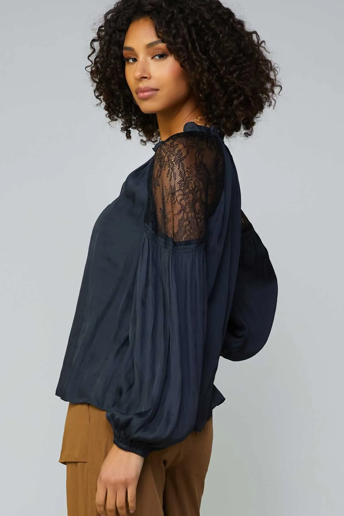 Sure! Heres an optimized title with descriptive modifiers:

Elegant Black Enchanted Satin Blouse for Women