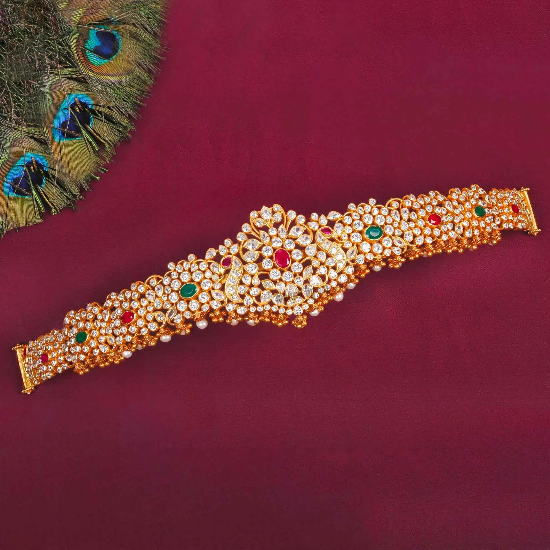 Gold Polish ruby ,emerald and cz stone Ottiyanam
